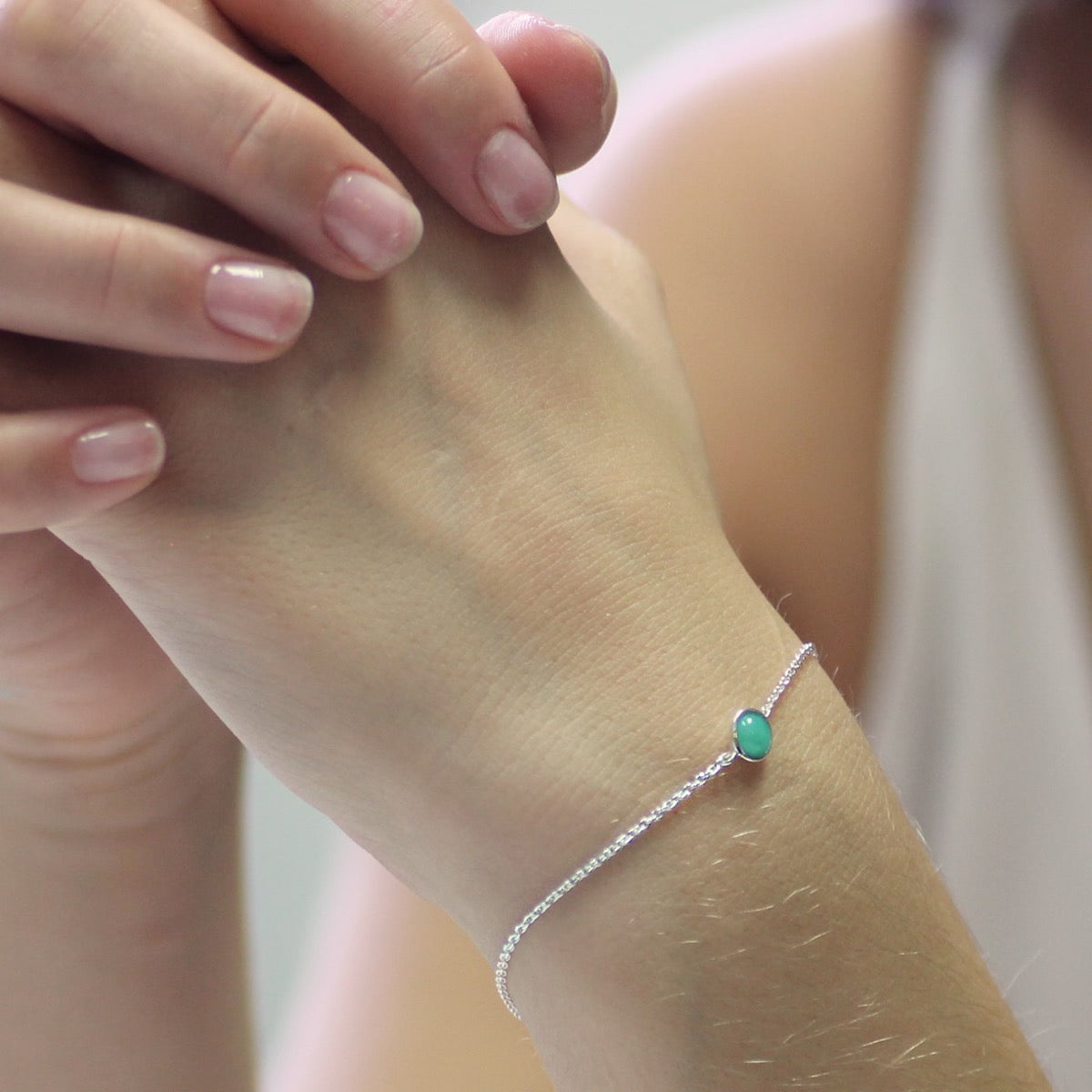 Silver and emerald birthstone bracelet