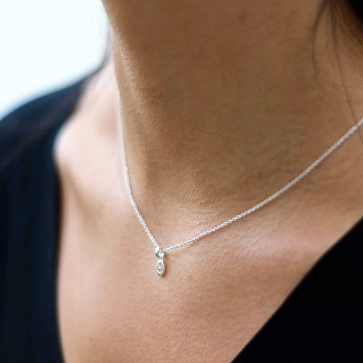 Silver number nine necklace