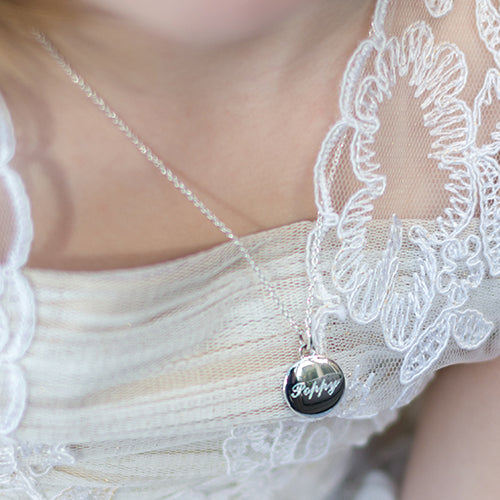 Silver pebble pendant necklace engraved with name