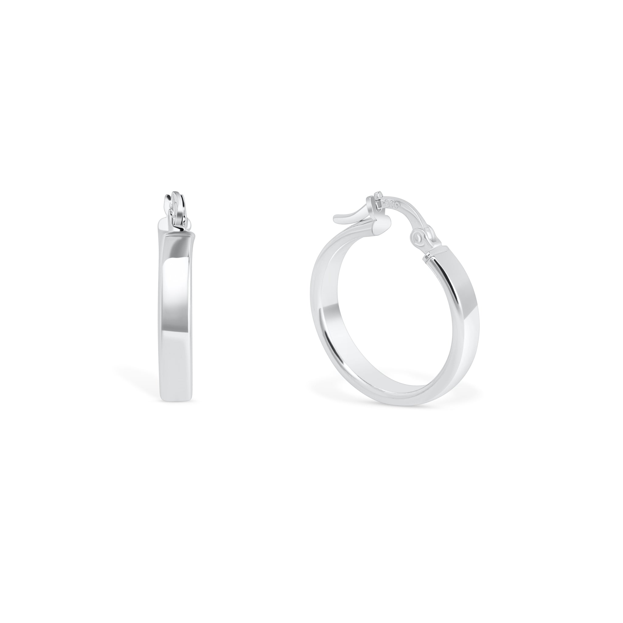 Silver hoop earrings on a white background
