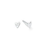 Silver heart-shaped earrings on a white background