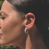 Sterling Silver Ridged Half Hoop Earrings on Model