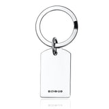 Silver dog tag keyring on a white background