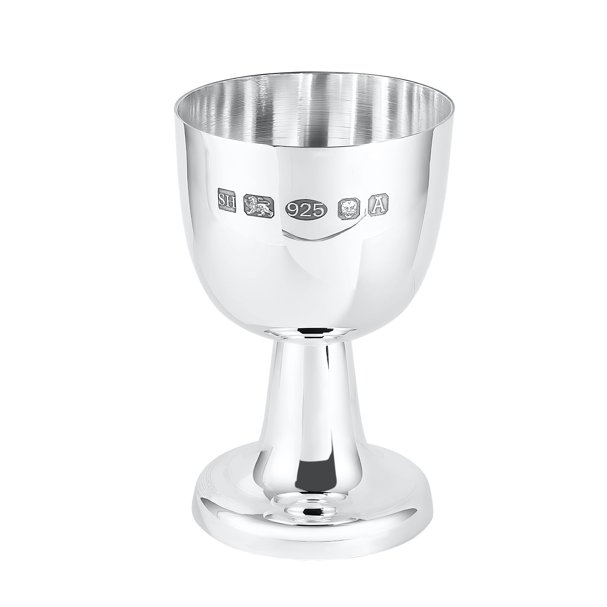 Silver egg cup with engraved hallmarks on a white background