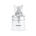 Silver fairy figurine on top of a silver container with hallmarks on a white background.