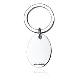 Silver oval keyring with hallmarks on a white background