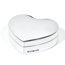 Heart-shaped sterling silver box on a white background