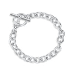 Silver chain bracelet with a t-bar clasp on a white background