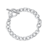 Silver chain bracelet with a t-bar clasp on a white background