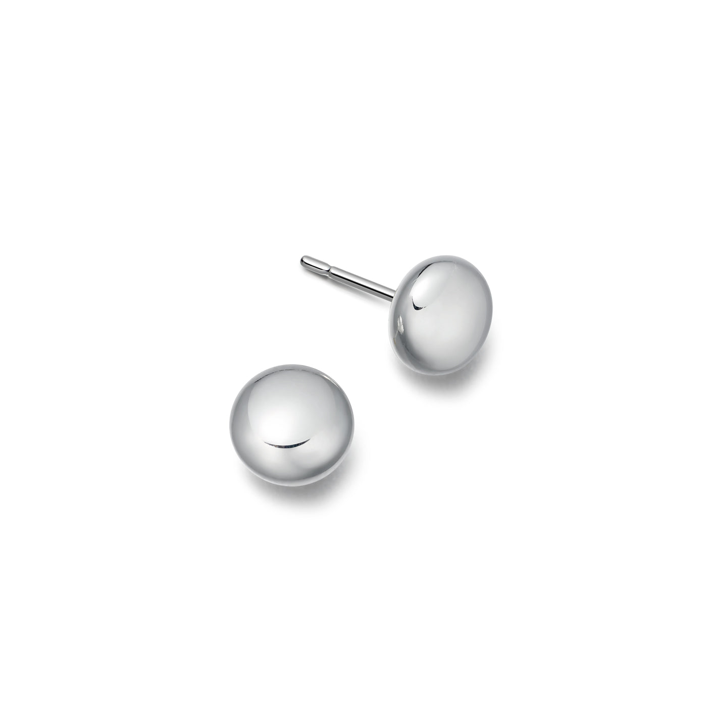 Pair of silver ball earrings on a white background