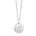 Silver necklace with a round pendant on a white background