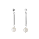 Pair of silver earrings with pearl drops on a white background