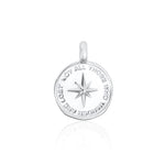 Silver pendant with north star design on a white background