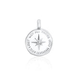 Silver pendant with north star design on a white background