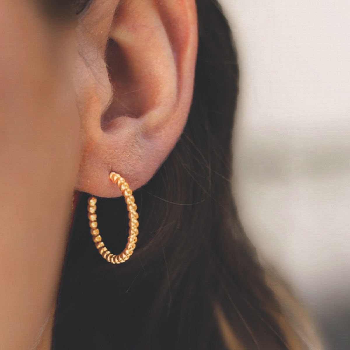 Gold plated and silver hoop earrings