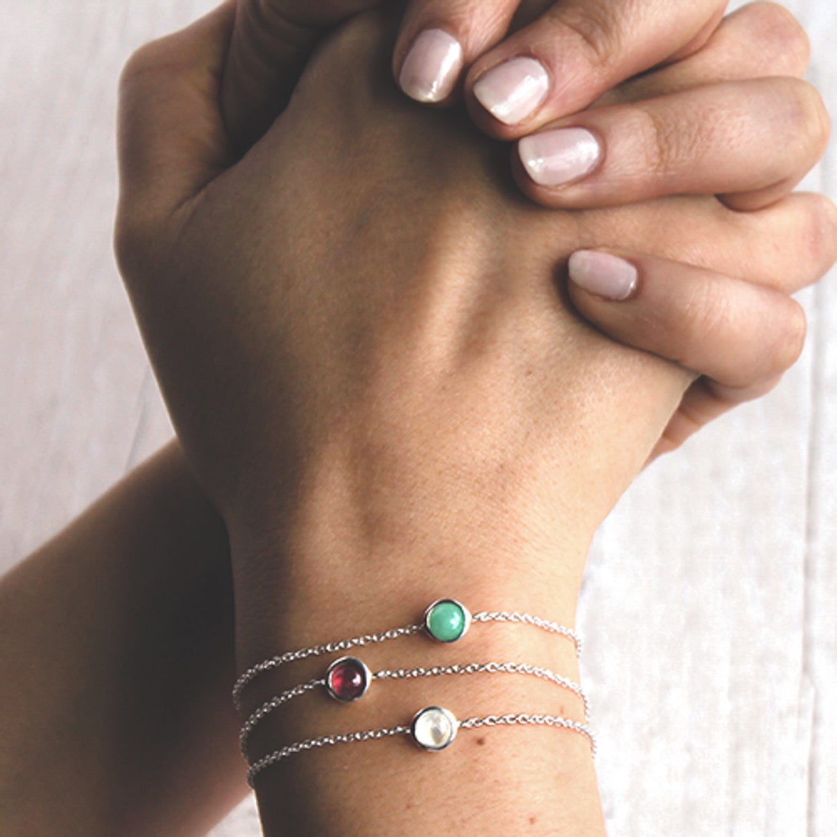 Silver birthstone bemerald bracelet 