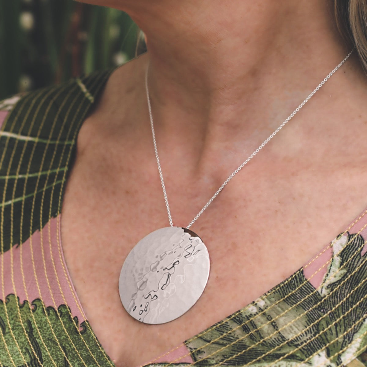 Large domed silver circle pendant 