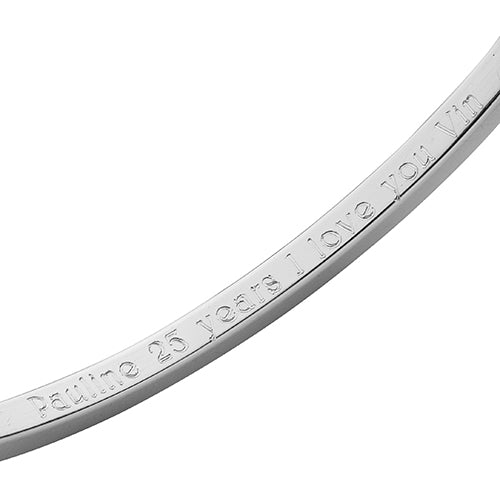 Engraved Oval Section Silver Bangle