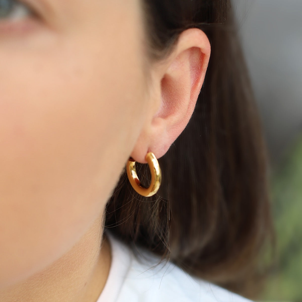 chunky gold and silver hoop earring