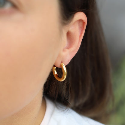 chunky gold and silver hoop earring