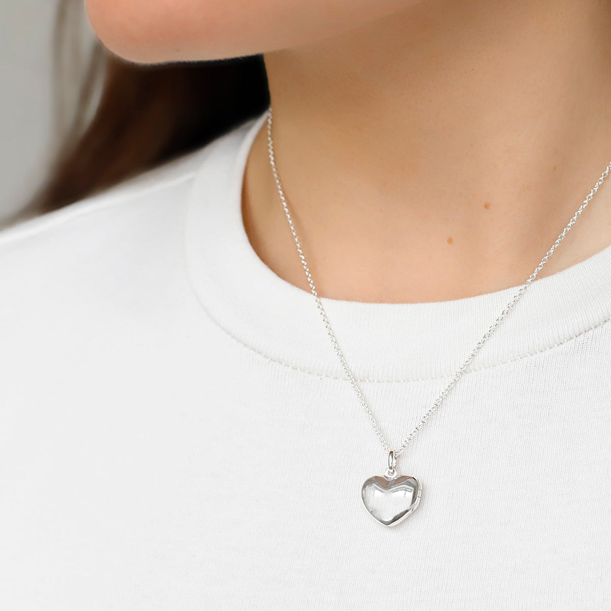 Small silver heart locket and chain