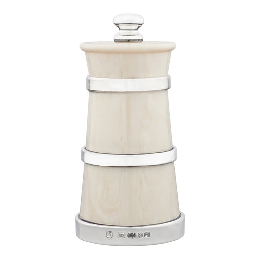 silver and white ivorine peppermill