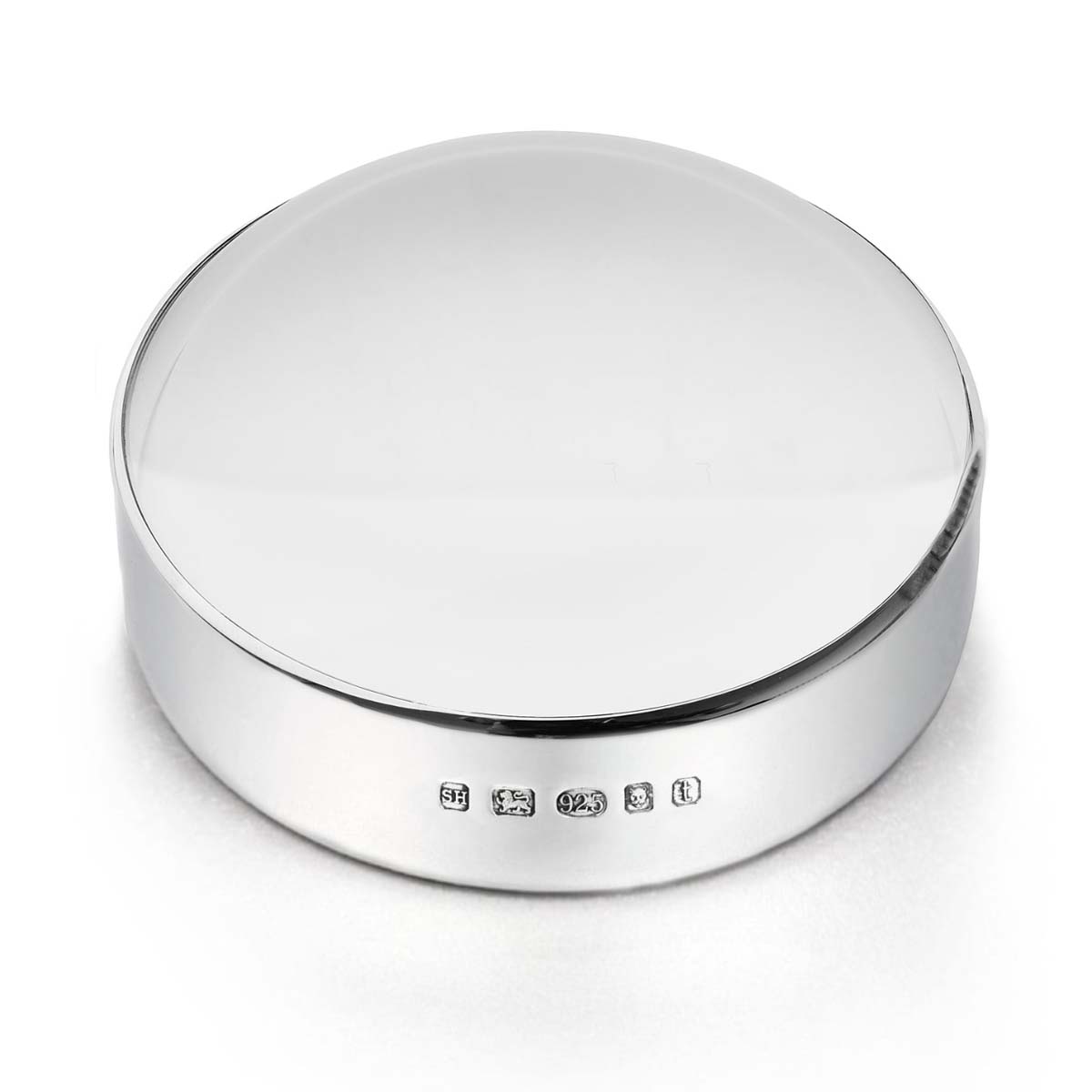 Silver magnifying paperweight