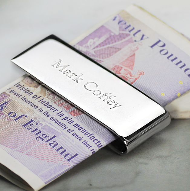 Engraved silver money clip.