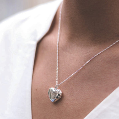 Silver heart shaped locket