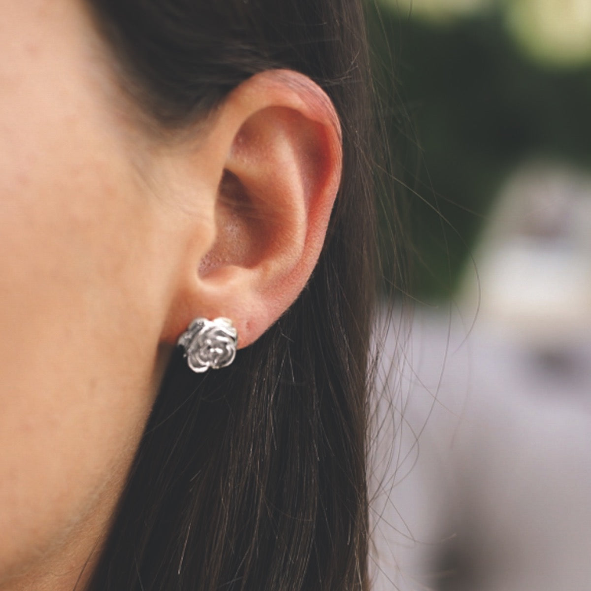 Silver rose stud earrings
