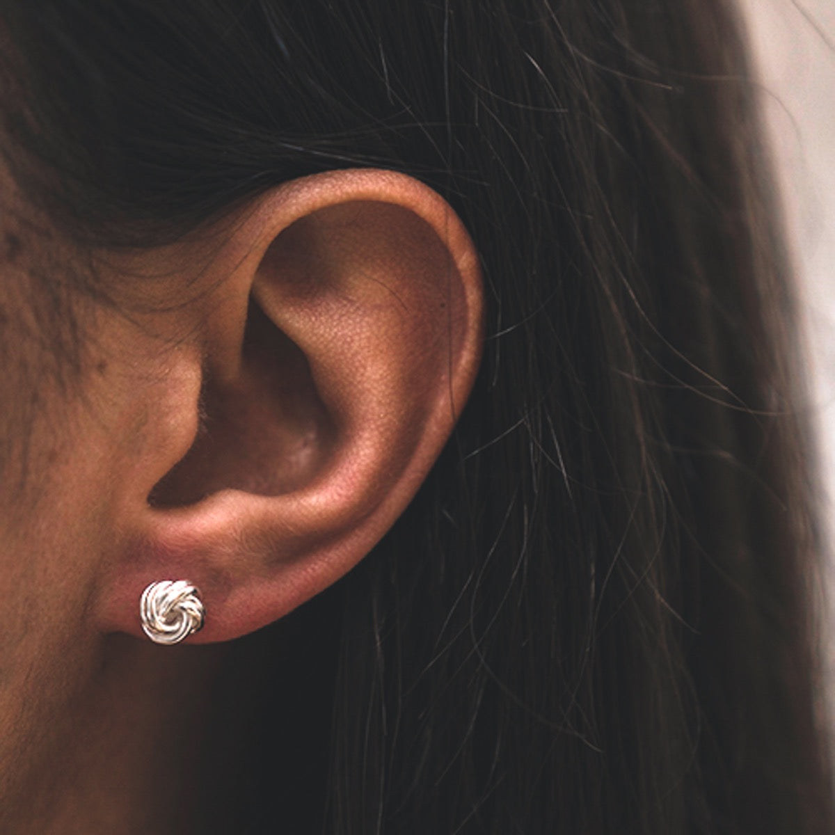 silver love knot earrings