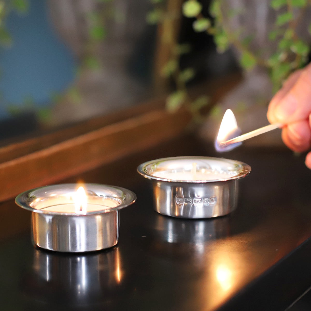 Silver tea light holders 