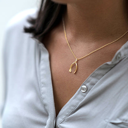 Gold wishbone necklace